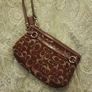 Purple Coach wristlet